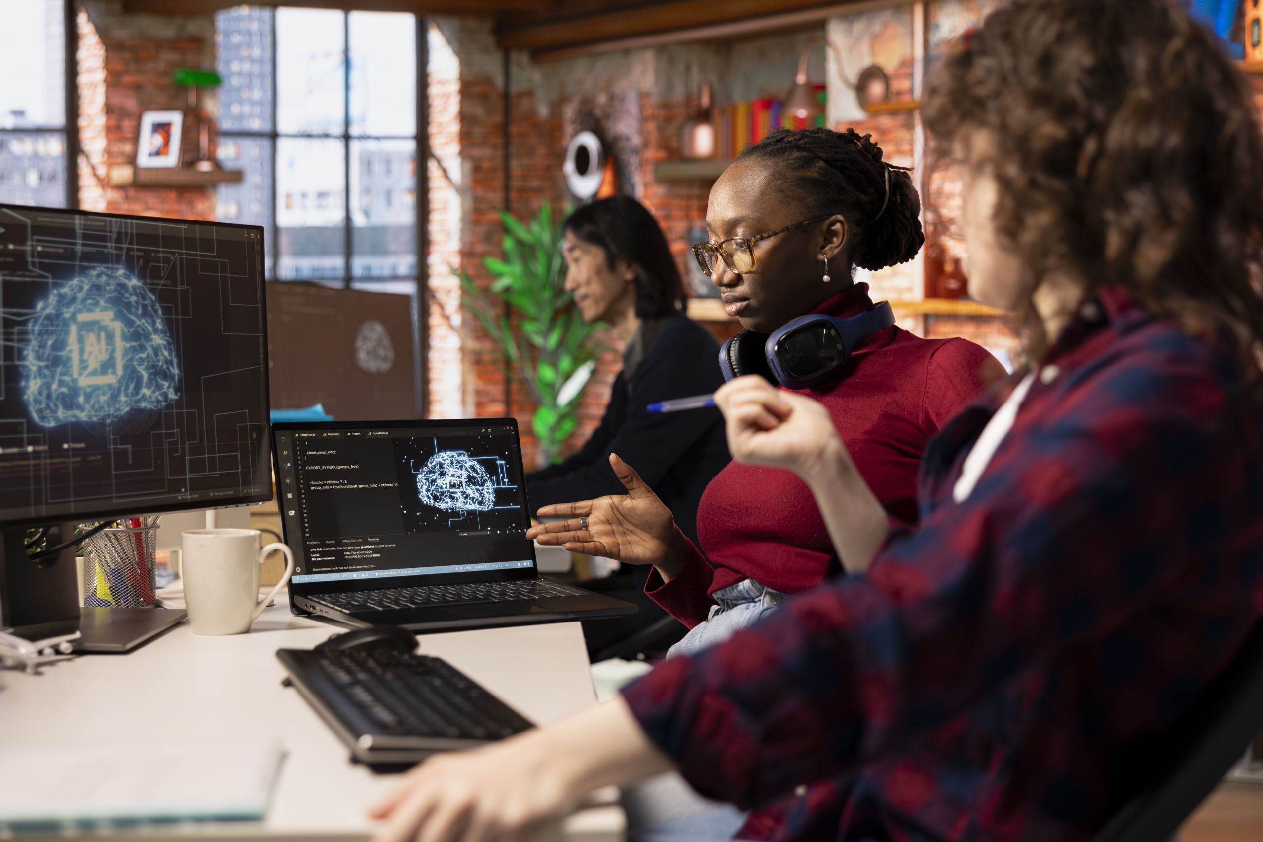 Teamworking startup technicians cooperating in AI industry company